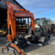 an orange and black construction vehicle
