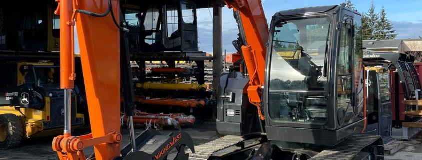 an orange and black construction vehicle