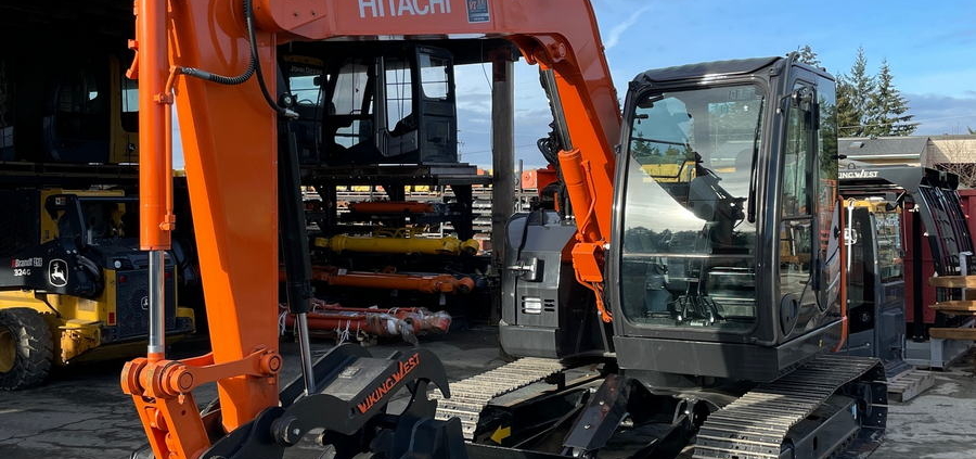 an orange and black construction vehicle